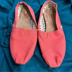 TOMS Vibrant Coral Canvas Slip-Ons